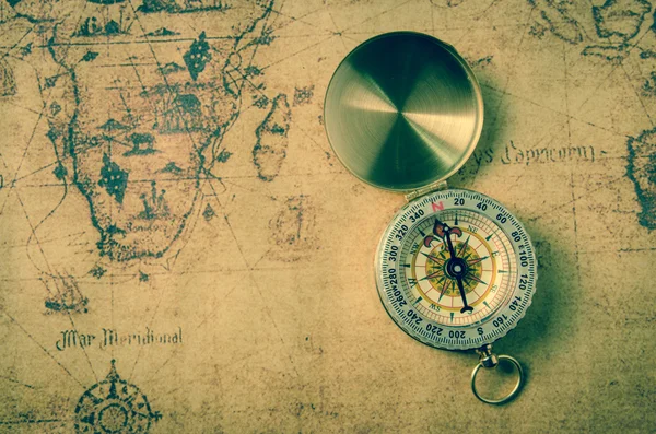 Vintage compass on old map — Stock Photo, Image