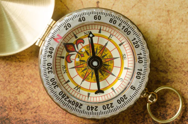 Compass on old map — Stock Photo, Image