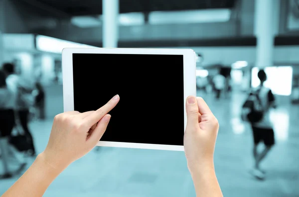 Woman hand holding the phone tablet on blur background — Stock Photo, Image