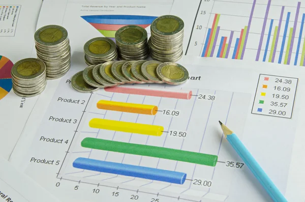 Stack of money coins on graph , business concept — Stock Photo, Image