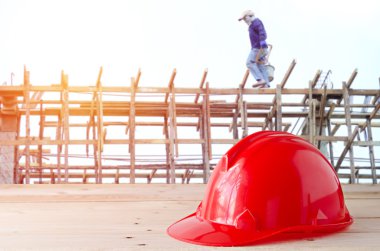 safety helmet in construction site clipart