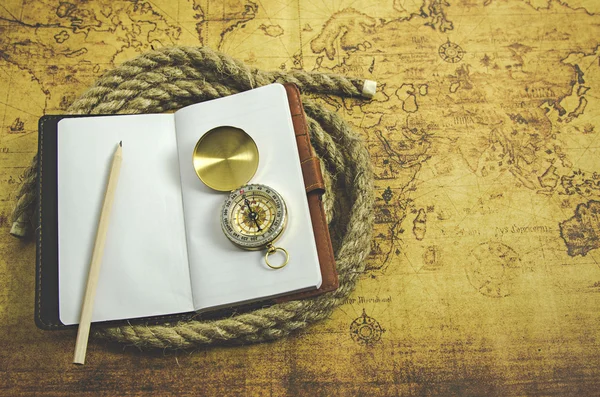 Compass on old map — Stock Photo, Image