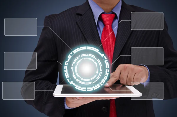 Business man holding tablet with business graph virtual screen — Stock Photo, Image