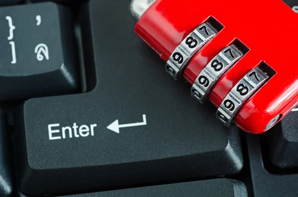 Red metal security lock on keyboard — Stock Photo, Image