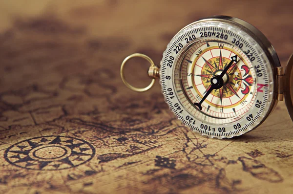 Compass on old map — Stock Photo, Image