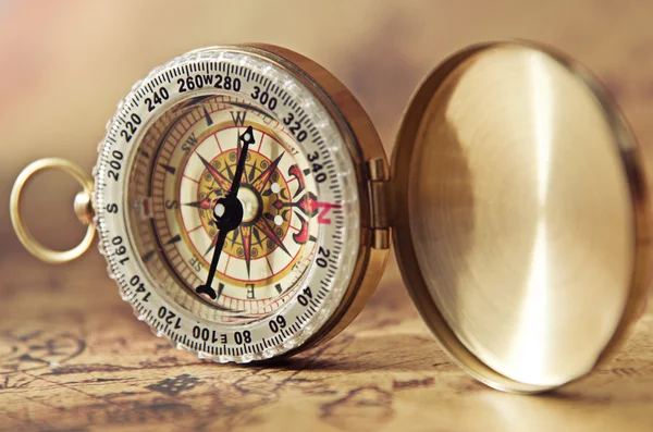 Compass on old map — Stock Photo, Image