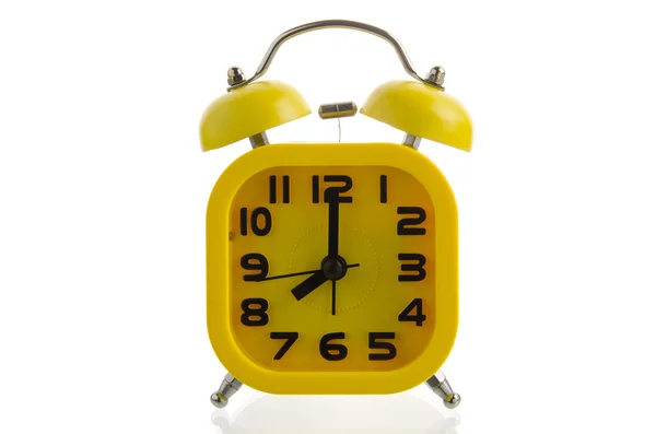 Yellow alarm clock on white background — Stock Photo, Image