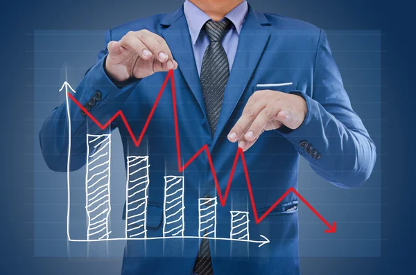 Business man try to bring graph up , business concept — Stock Photo, Image