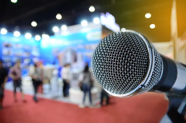 Microphone with blurred event background — Stock Photo, Image