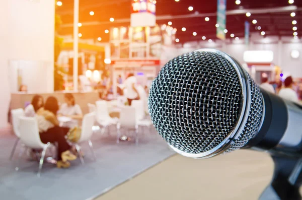 Microphone with blurred event background — Stock Photo, Image