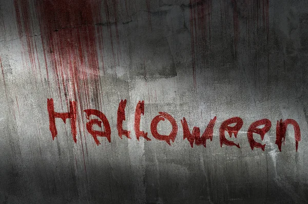 Testo di sangue Halloween sul muro di pietra grunge — Foto Stock