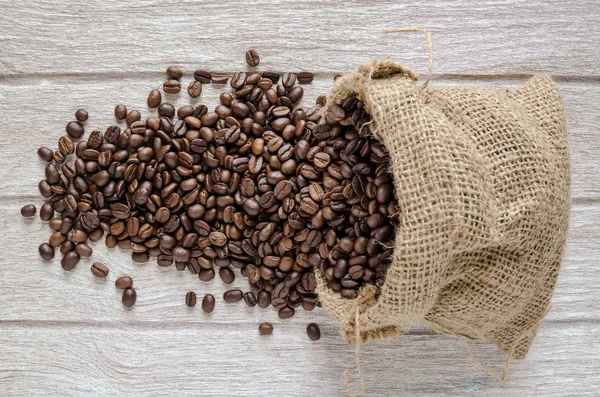 Coffee beans in bag — Stock Photo, Image