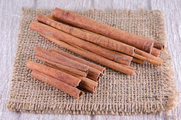 Cinnamon stick on sack , chinese food ingredient — Stock Photo, Image