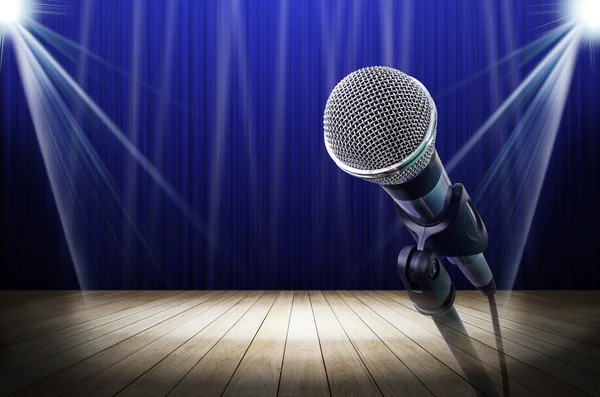 Microphone on blue light stage — Stock Photo, Image