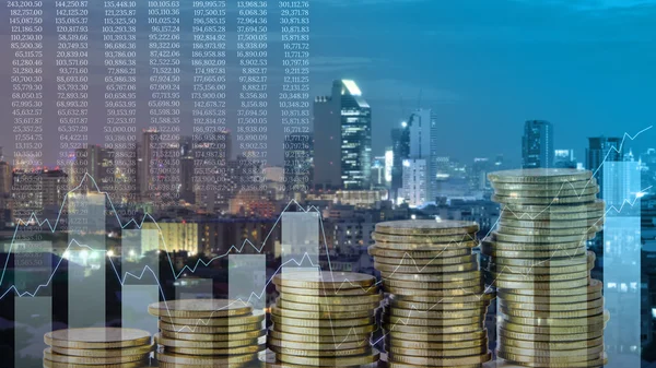 Stack of coins with technical graph — Stock Photo, Image