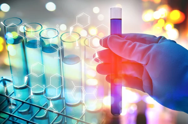 Double exposure of scientist hand holding laboratory test tube — Stock Photo, Image