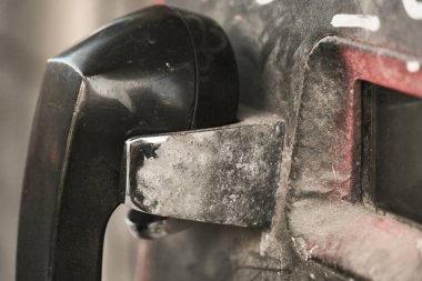 black push-button public payphone close-up, broken dusty vintage city telephone detail, dirty plastic phone close view, old-fashioned telephone booth element closeup, part of social push-button phone