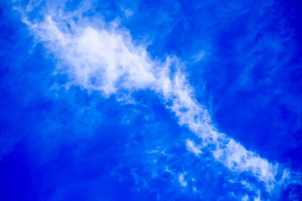 beautiful deep clear blue sky, view on white creamy and fluffy high cumulus clouds, abstract dream cloud background for relaxation and meditation, light heaven with space, skies texture and pattern