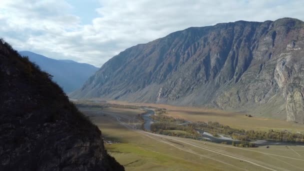 Flight over the mountains. Top view hills and river — Stock Video