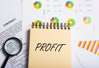 Sarı sarmal defter, analitik çizelge dokümanları, sözleşmeli ve büyültücü, karlı bir anlaşma.