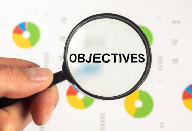 Hedefler, analitik dokümanların pazarlanması, iş hedefleri üzerine büyüteç yoluyla yazıtlar.