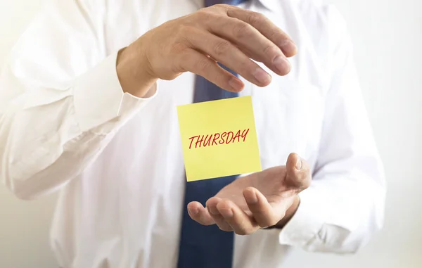 Thursday word in male hands. days of week concept — Stock Photo, Image