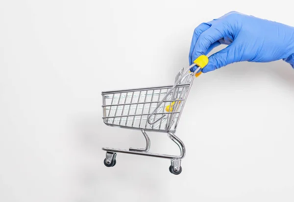 Shopping Metal Empty Cart Male Hand Blue Protecive Glove Shopping — Stock Photo, Image