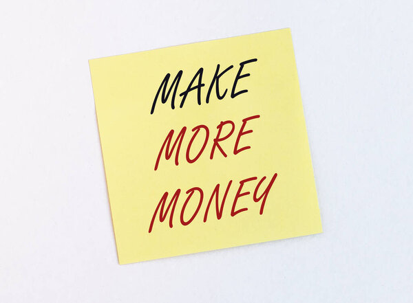 Make more money inscription words. Financial ambitions concept.