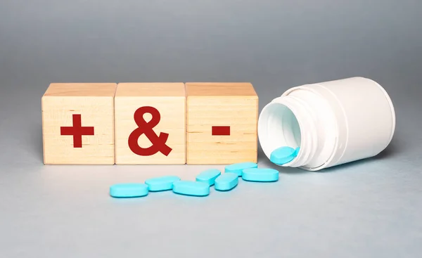 Minus vs plus signs, comparison of opposites, positive vs negative, pros and cons of medical pills. treatment and side effects