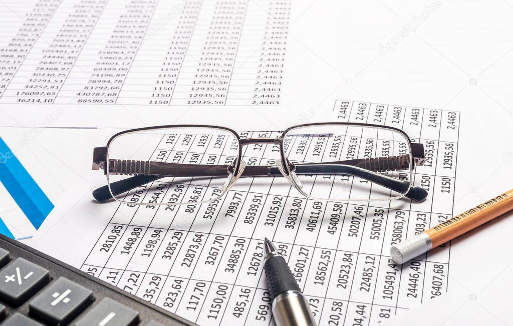 Business financial concept. Accountant workplace with documents close up