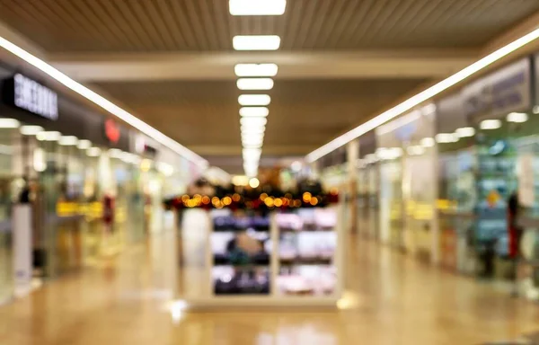 Empty corridor of mall or supermarket. Blurred background.