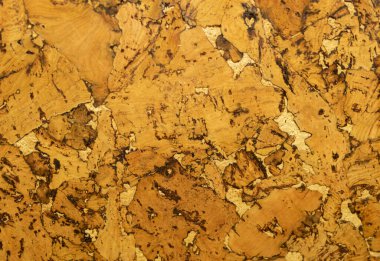 Sarı ve kahverengi mantar kaplama. Şekillerle desenli arkaplan.