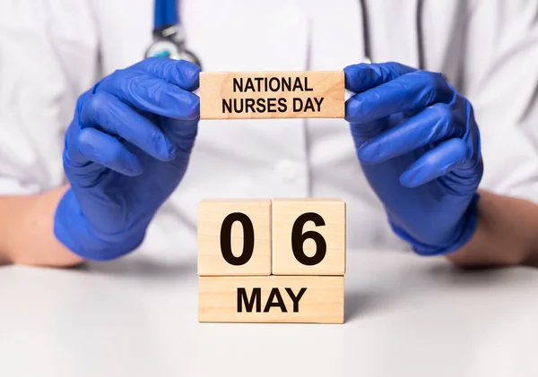 National nurses day, 6 may in doctor hands.