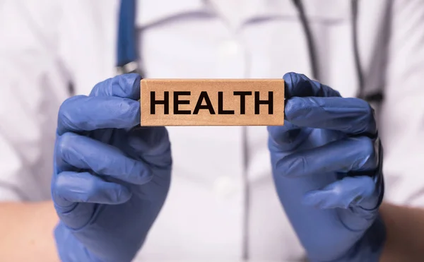 Egészséges szó. Egészségügyi ellátás és az egészséges életbiztosítás fogalma — Stock Fotó