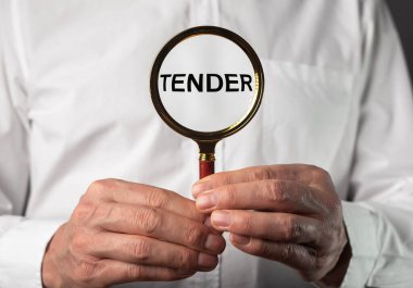 İş ihalesi konsepti. Büyüteçle sözcük.