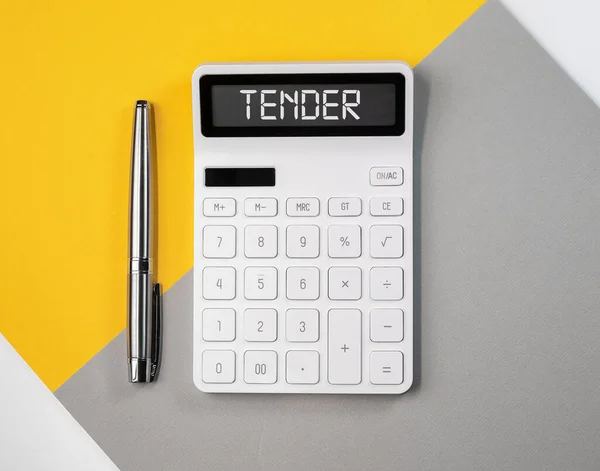 TENDER word on calculator. Business public offer concept — Stock Photo, Image