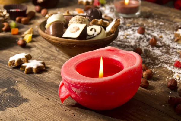 Christmas food decoration  with red candle Royalty Free Stock Images