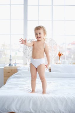 cupid waving hand sweet baby smiling flying clipart