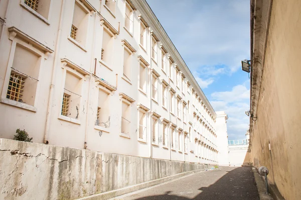 Row of windows with bars — Stock Photo, Image