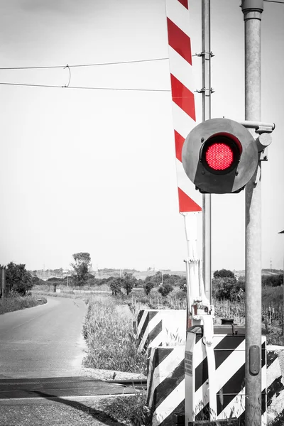 Red traffic light crossing level — Stock Photo, Image