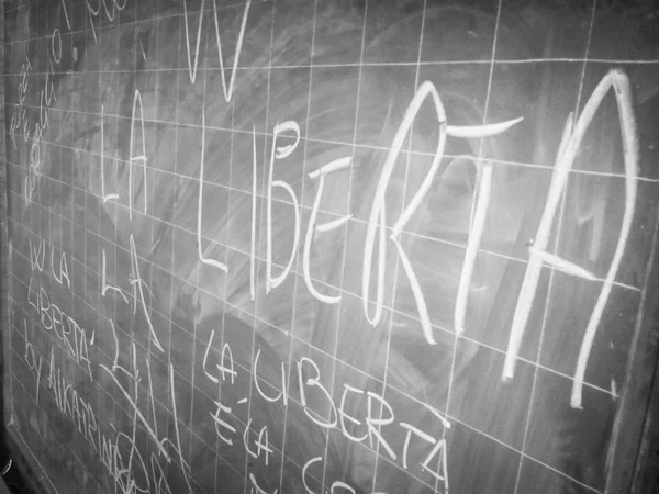 Blackboard in old prison — Stock Photo, Image