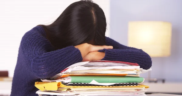 Japanese woman overwhelmed with work — Stock Photo, Image