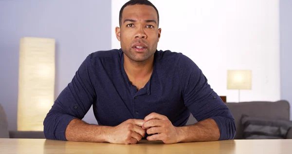 Black man looking worried and concerned — Stock Photo, Image