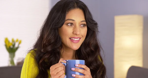 Mexican woman enjoying her cup of coffee — Stock Photo, Image