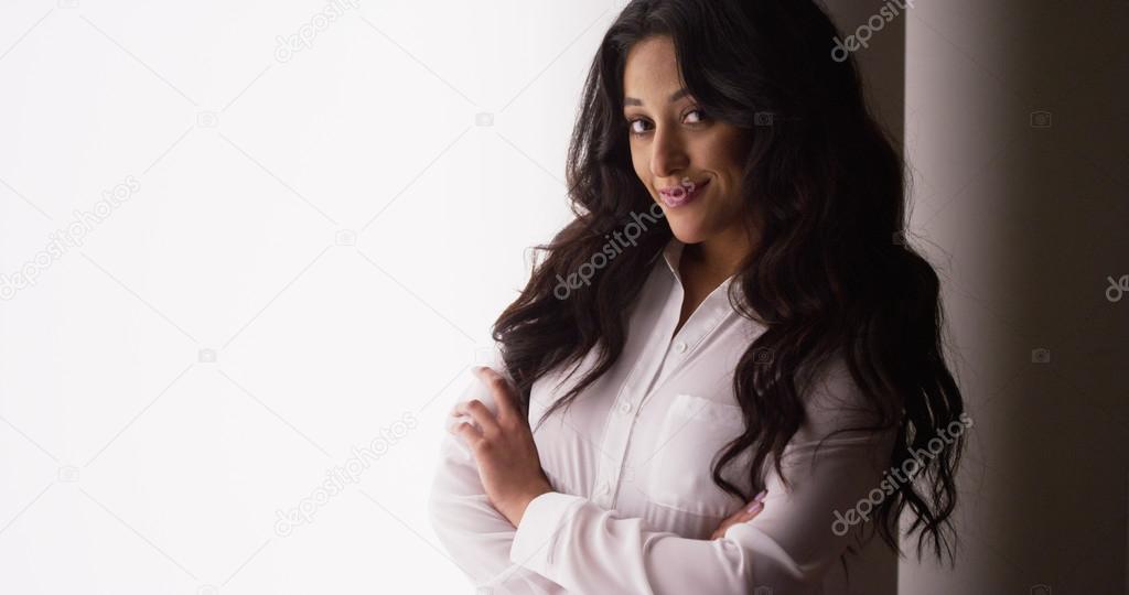Mexican businesswoman looking at camera