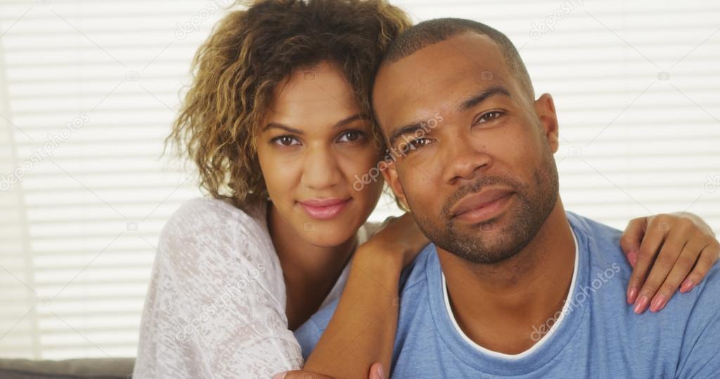 Happy Black couple smiling