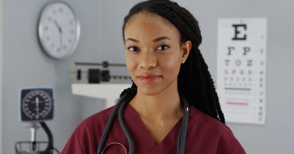 Successful Black woman doctor smiling at camera — Stock Photo, Image