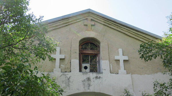 A orthodox church building with a christian cross on it. Georgian Orthodox Church located in Azerbaijan, Gakh