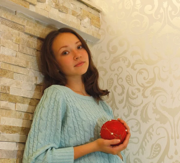 Girl with Christmas ball in hands — Stock Photo, Image