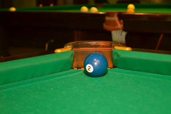 Billiard ball number two near billiard hole — Stock Photo, Image